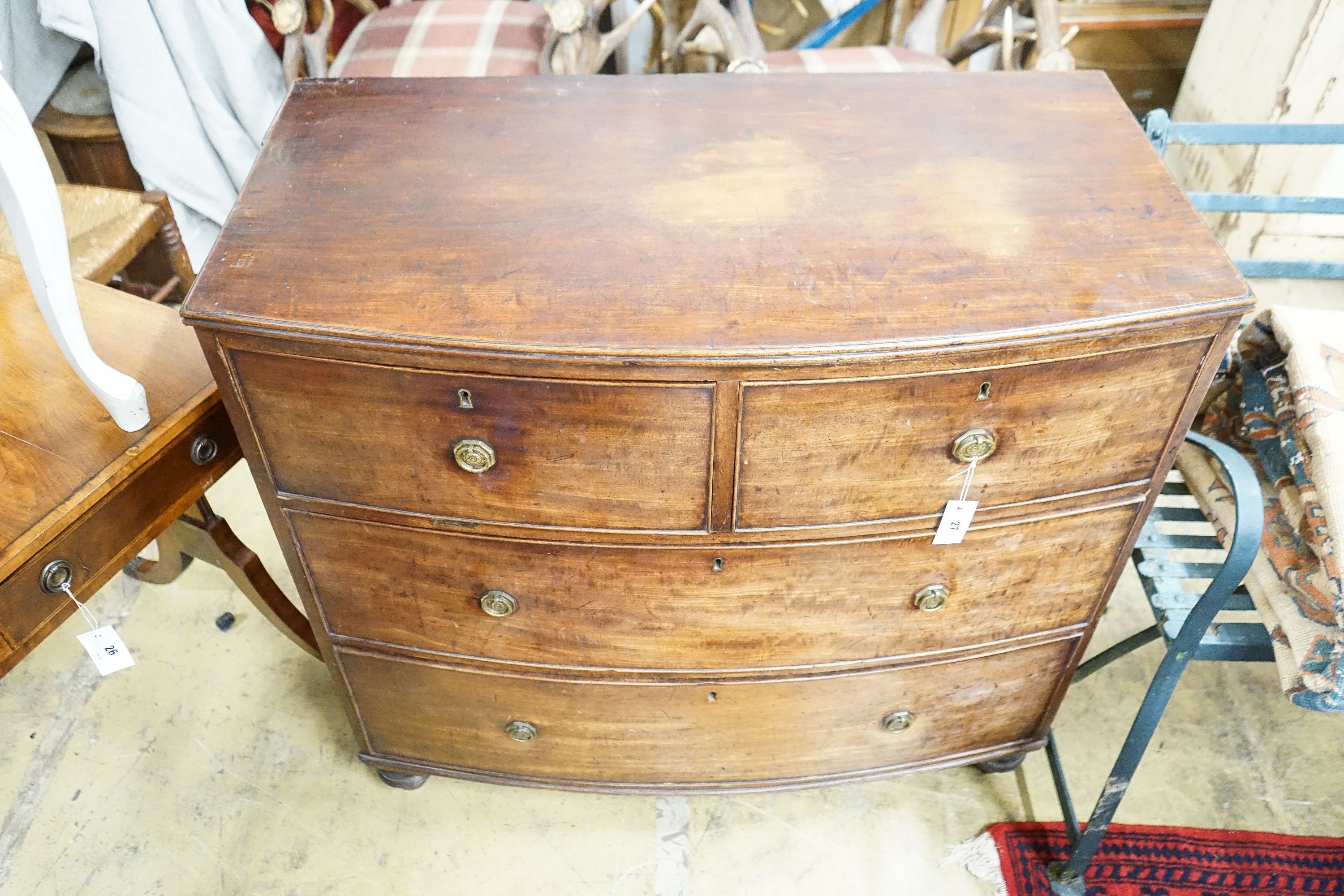 A Regency mahogany bow front four drawer chest, width 100cm, depth 53cm, height 92cm